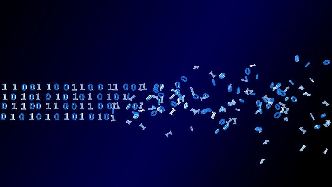 binary code disintegrating to illustrate data destruction