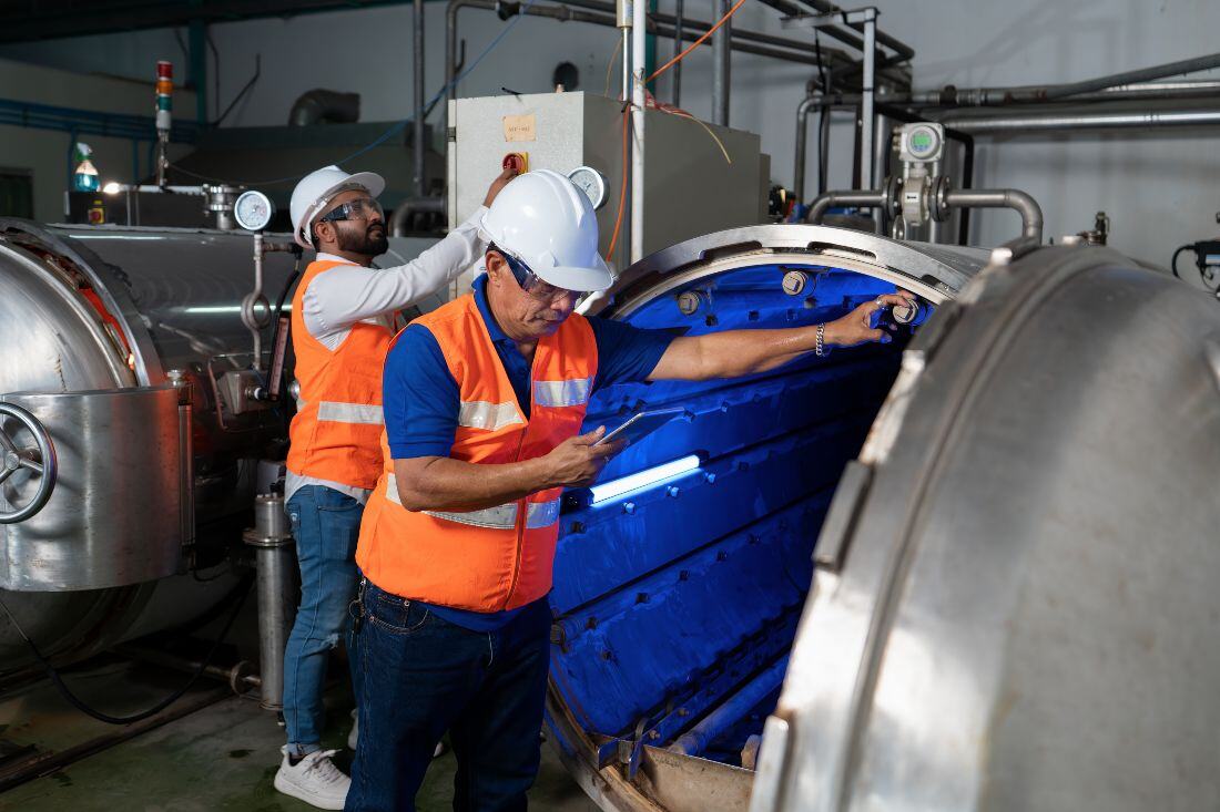 maintenance engineers performing inspection during plant shutdown