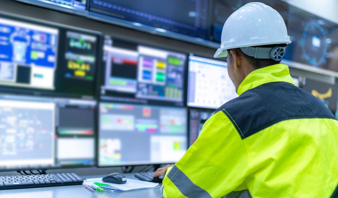 Industrial cybersecurity engineer in control room